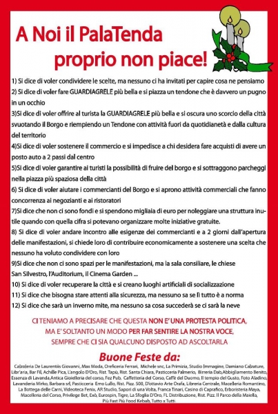Il manifesto di protesta affisso dai commercianti